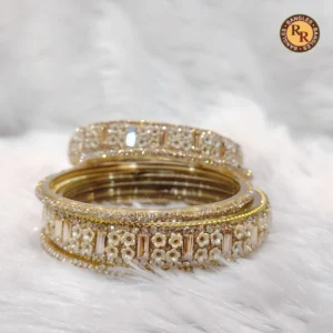 gold-glass-bangle-set-dense-white-pearl-flower-cluster-embellished-luxury-bridal-glass-bangles-wedding-festive-wear-wholesale-bangles