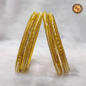 yellow-transparent-glass-bangle-set-gold-cut-pattern-textured-traditional-glass-bangles-haldi-ceremony-festive-wear-wholesale-bangles